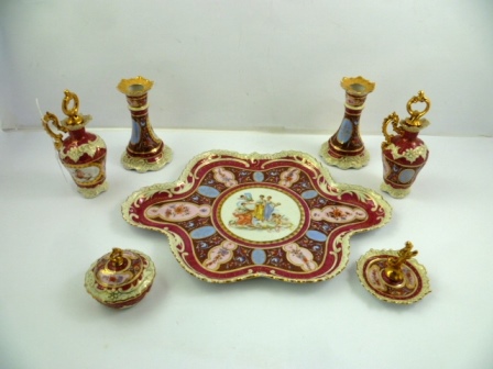 A 20TH CENTURY AUSTRIAN PORCELAIN DRESSING TABLE SET, underglazed banded in red with painted