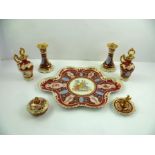 A 20TH CENTURY AUSTRIAN PORCELAIN DRESSING TABLE SET, underglazed banded in red with painted