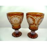 A PAIR OF 20TH CENTURY (probably Stourbridge) AMBER FLASH OVERLAID CUT LEAD CRYSTAL VASES, each with