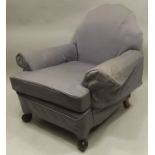 AN EARLY 20TH CENTURY MAHOGANY AND BEECH SETTEE AND MATCHING CHAIR, all over upholstered in grey