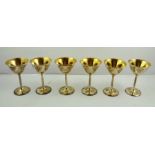 C J VANDER A SET OF SIX SILVER GOBLETS, each having vine leaves, plain stem and matching base,