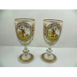 A PAIR OF CONTINENTAL GLASS GOBLETS each decorated in polychrome with a vignette of a dandy