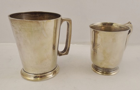 ERNEST HAYWOOD A PLAIN CONICAL ONE PINT MUG having folded rim and geometric handle, Birmingham 1941,