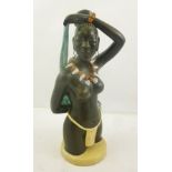 A 1930's/1950's ANZENGRUBER EARTHENWARE MODEL of a topless black girl with tribal necklace, no.13.