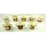 A SELECTION OF EIGHT VARIOUS PORCELAIN AND BONE CHINA TWO-HANDLED CUPS, to include Royal Crown