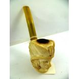 A MEERSCHAUM PIPE the bowl carved with the head of an Indian Chief, 15cm