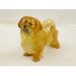 ROYAL WORCESTER MODELLED BY DORIS LINDNER A BONE CHINA MODEL OF A STANDING PEKINESE