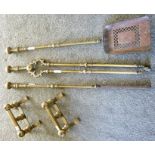 A SET OF THREE BRASS VICTORIAN FIRESIDE TOOLS, comprising shovel, tongs and poker, with a pair of