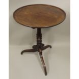 A PART 19TH CENTURY MAHOGANY TRIPOD TABLE in the Georgian manner, having an earlier tray top, turned