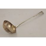 A GEORGE III SILVER SOUP LADLE with monogrammed handle, bearing indistinct makers mark, London 1818,