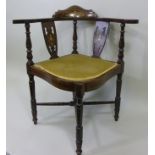 A LATE VICTORIAN INLAID MAHOGANY CORNER CHAIR, having urn and floral crest rail and splat, green