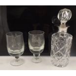 A LEAD CRYSTAL CUT GLASS DECANTER with silver collar, Birmingham 1974, and a cut glass stopper,