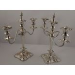 A PAIR OF SILVER PLATED TWIN BRANCH CANDELABRAS, 37cm high