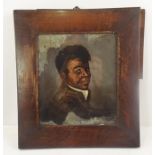 19TH CENTURY SCHOOL A reverse glass painted portrait of a young black man, 19 x 16cm in mahogany