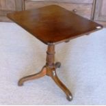 A 19TH CENTURY MAHOGANY SQUARE SNAP-TOP WINE TABLE, raised on turned stem with tripod supports, 57cm