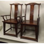 A PAIR OF 20TH CENTURY CHINESE HARDWOOD OPEN ARMCHAIRS, each having a moustache shaped crest rail,