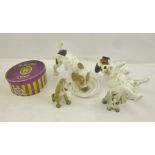 TWO ROYAL DOULTON EARTHENWARE PUPPIES, one licking from a plate, HN1158, the other back