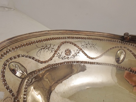 A LATE PERIOD SHEFFIELD PLATE OVAL FRUIT BASKET having swing handle, fretted and tooled with - Image 2 of 2