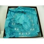 MARINA & SUSANNA SENT A Murano glass filament necklace of graduated blown clear glass spheres,