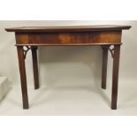 A 19TH CENTURY MAHOGANY SIDE OR SILVER TABLE the rectangular top with moulded edge, raised on