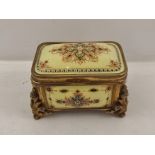 A LATE 19TH CENTURY FRENCH TABLE CASKET, a gilded Rococo frame inset domed yellow ground panels with