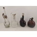 A 19TH CENTURY TEAR DROP FORM WINE CARAFE with cast metal fruiting vine handle and chained