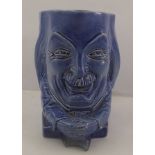 PERCY METCALF AN ASHTEAD EARTHENWARE CHARACTER JUG OF DAVID LLOYD GEORGE in blue colourway, 284/