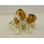 ROYAL WORCESTER MODELLED BY DORIS LINDNER A BONE CHINA GROUP OF THREE FOX HOUND PUPPIES