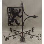 A WROUGHT IRON WEATHER VANE with pierced lion rampant design, 93cm high