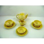 A MID 20TH CENTURY SUSIE COOPER EARTHENWARE TEASET decorated in banded yellow and brown and brown