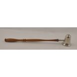 ARI D. NORMAN A 20TH CENTURY GEORGIAN DESIGN SILVER CANDLE SNUFFER with turned wood handle, 28cm