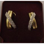 A PAIR OF MODERNIST BI-COLOUR GOLD COLOURED METAL CLIP EARRINGS for pierced ears, each set with a