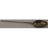 AN EARLY 18TH CENTURY BRITANNIA STANDARD MOTE SPOON with rat tail pierced bowl, initialled A.I.D.