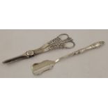 A VICTORIAN CHEESE SCOOP Birmingham 1899 and a PAIR OF VICTORIAN PIERCED SILVER PLATED GRAPE