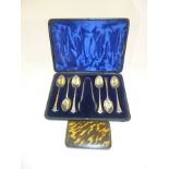 A SET OF SIX SILVER COFFEE SPOONS AND MATCHING TONGS, with twist stems in original vending box,