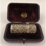 W H LEATHER & SON A VICTORIAN SILVER SCENT BOTTLE cylindrical with all-over tooled floral and