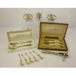 A FRENCH SILVER HANDLED HAM BONE HOLDER, together with two cased sets of Continental child's