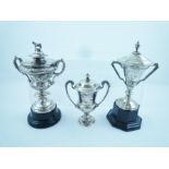 ELKINGTON AND CO A GEORGE V SILVER TROPHY of double handled urn form, bacchus mask and swag