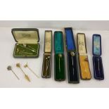 A SELECTION OF FOURTEEN GEM SET AND PASTE GOLD COLOURED METAL MOUNTED TIE PINS, two set opals, one