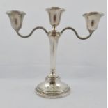 A SILVER TWIN BRANCH CANDELABRUM fitted three sconces, Birmingham 1966, 21cm high