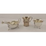 A SELECTION OF SILVER ITEMS comprising; a child's mug, Birmingham 1933, a sauce boat, Sheffield