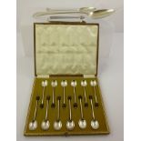 COOPER BROTHERS AND SONS LTD. A SET OF TWELVE EARLY 20TH CENTURY SILVER COFFEE SPOONS with bean