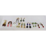 TEN PAIRS OF GILT METAL EARRINGS in early 20th century styles, principally drops