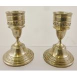 MAPPIN & WEBB A PAIR OF SPUN SILVER CANDLESTICKS, each having a rolled and pierced top, urn stem and