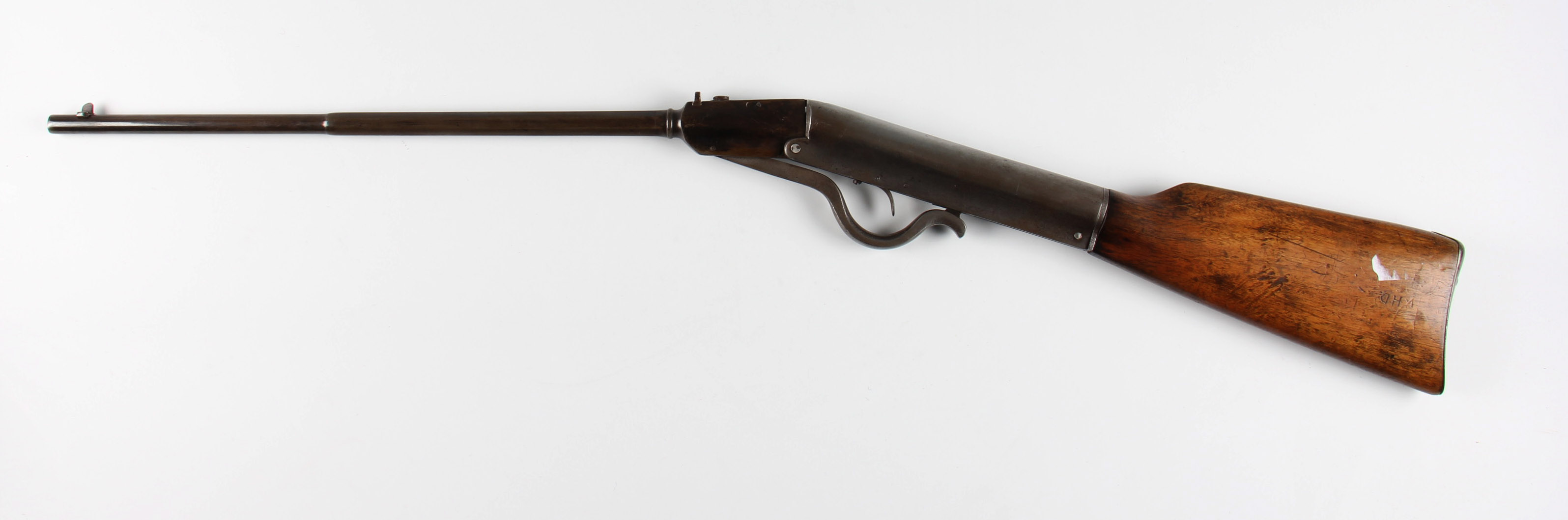 *A 20th Century D.R.G.M. German air rifle having black body and barrel with lock lever plus wooden