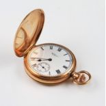 A 9ct yellow gold cased Waltham USA crown wind full hunter pocket watch, the white enamel dial