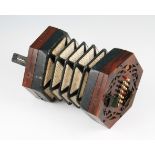 A 19th Century 24 button accordion by Louis Lachenal, London, with paper covered bellows with