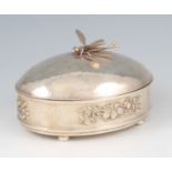 A Thistle & Bee silver lidded box with applied dragonfly motif, the hammered effect body decorated
