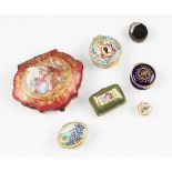 A group of seven assorted porcelain and enamel boxes to include four Halcyon Days examples including