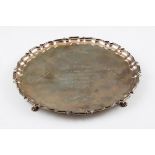 A silver salver, of circular form with pie crust rim, having inscription engraved to centre